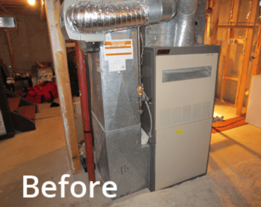 Old furnace before Distinct Heating & Cooling installs a new one.
